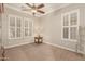 Spacious bedroom with plenty of natural light and a ceiling fan at 2299 E Saddlebrook Rd, Gilbert, AZ 85298