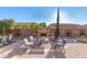 Relaxing backyard patio with seating area and fire pit at 2299 E Saddlebrook Rd, Gilbert, AZ 85298