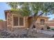 Craftsman style home with stone accents and desert landscaping at 2299 E Saddlebrook Rd, Gilbert, AZ 85298