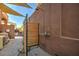 Outdoor shower with wood privacy screen, adjacent to patio area at 15426 S 4Th Ave, Phoenix, AZ 85045