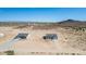 Aerial view of two new homes on desert lots, showcasing desert landscape at 1587 S 391St Ave, Tonopah, AZ 85354