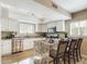 Modern kitchen with granite countertops, white cabinets, and a kitchen island at 14679 N Love Ct, Fountain Hills, AZ 85268