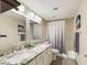 Bathroom with double vanity, granite countertop, and a tub shower combo at 14679 N Love Ct, Fountain Hills, AZ 85268