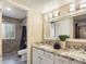 Bathroom with double vanity, granite countertop and a large walk in shower at 14679 N Love Ct, Fountain Hills, AZ 85268