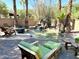 Tranquil backyard oasis with pond, waterfall, and lounge chairs at 14679 N Love Ct, Fountain Hills, AZ 85268