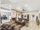 Spacious living room with a fireplace, pool table, and comfortable seating at 14679 N Love Ct, Fountain Hills, AZ 85268