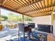 Relaxing patio features seating, hot tub, and pergola at 14679 N Love Ct, Fountain Hills, AZ 85268