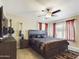 Spacious bedroom with king-size bed and large windows at 14679 N Love Ct, Fountain Hills, AZ 85268