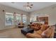 Living room with a view of the pool and kitchen at 22938 S 193Rd St, Queen Creek, AZ 85142