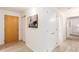 Bright condo entryway with wood door and closet at 7117 E Rancho Vista Dr # 2005, Scottsdale, AZ 85251