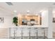 Modern kitchen with island, stainless steel appliances and barstools at 7117 E Rancho Vista Dr # 2005, Scottsdale, AZ 85251