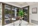 Bright breakfast nook with large windows and seating for two at 7117 E Rancho Vista Dr # 2005, Scottsdale, AZ 85251
