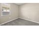 Simple bedroom with neutral walls and carpet flooring at 1471 S 239Th Dr, Buckeye, AZ 85326