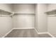 Spacious walk-in closet with double hanging rods at 1471 S 239Th Dr, Buckeye, AZ 85326