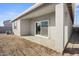Covered patio with sliding glass doors at 1471 S 239Th Dr, Buckeye, AZ 85326