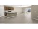 Open concept kitchen with island and access to backyard at 1471 S 239Th Dr, Buckeye, AZ 85326