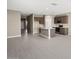 Open concept kitchen with island, stainless steel appliances and tile floor at 1471 S 239Th Dr, Buckeye, AZ 85326