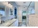 Bathroom boasts double vanity, granite countertops, and a large walk-in shower at 775 E Leslie Ave, San Tan Valley, AZ 85140
