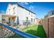 Landscaped backyard with patio and artificial turf at 775 E Leslie Ave, San Tan Valley, AZ 85140