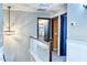 Upstairs hallway with access to bedrooms and bathroom at 775 E Leslie Ave, San Tan Valley, AZ 85140