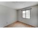 Bedroom with wood-look flooring and window at 2623 N 62Nd Ave, Phoenix, AZ 85035