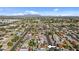 Wide shot showing the property's location in a residential neighborhood at 7428 E Carol Cir, Mesa, AZ 85208