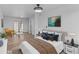 Main bedroom with sitting area and stylish decor at 7428 E Carol Cir, Mesa, AZ 85208