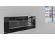 Modern electric fireplace with a sleek, black frame at 7428 E Carol Cir, Mesa, AZ 85208