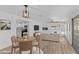 Open concept living and dining area with modern decor at 7428 E Carol Cir, Mesa, AZ 85208
