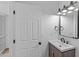 Modern bathroom with updated vanity, lighting, and mirror at 7428 E Carol Cir, Mesa, AZ 85208