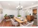 Spacious dining area with hardwood floors, and kitchen views at 5745 N 13Th St, Phoenix, AZ 85014