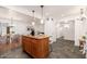Open kitchen with island and stainless steel appliances at 5745 N 13Th St, Phoenix, AZ 85014
