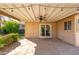 Covered patio with ceiling fan, sliding glass door and nice backyard view at 5745 N 13Th St, Phoenix, AZ 85014