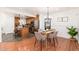 Bright dining area with wood floors and modern light fixture at 5745 N 13Th St, Phoenix, AZ 85014