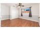 Simple bedroom with hardwood floors, double door closet and window at 5745 N 13Th St, Phoenix, AZ 85014