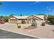 Single story home with two car garage and manicured landscaping at 15758 W Edgemont Ave, Goodyear, AZ 85395
