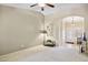 Living room features neutral color palette and entryway views at 15758 W Edgemont Ave, Goodyear, AZ 85395