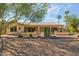 Landscaped backyard with gravel and desert plants at 15758 W Edgemont Ave, Goodyear, AZ 85395