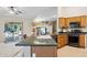 Spacious kitchen with island, stainless steel appliances, and ample cabinetry at 15758 W Edgemont Ave, Goodyear, AZ 85395