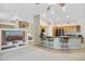 Open concept kitchen with breakfast bar and views into living room at 15758 W Edgemont Ave, Goodyear, AZ 85395