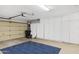 Spacious garage with built-in cabinets and ample storage at 15758 W Edgemont Ave, Goodyear, AZ 85395