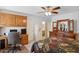 Bedroom with a desk, safe, and dresser at 15758 W Edgemont Ave, Goodyear, AZ 85395