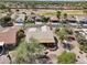 Community overview showing homes and green spaces at 15758 W Edgemont Ave, Goodyear, AZ 85395