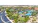 Well-maintained tennis courts with surrounding landscape at 15758 W Edgemont Ave, Goodyear, AZ 85395