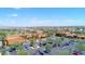 Aerial view of community with pool, clubhouse, and parking at 15758 W Edgemont Ave, Goodyear, AZ 85395