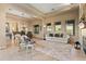 Spacious living room featuring a light color palette and comfortable seating at 2554 N Tambor --, Mesa, AZ 85207