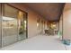 Covered patio with seating area and access to the interior at 2554 N Tambor --, Mesa, AZ 85207