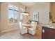 Breakfast nook with a round table and chairs, offering natural light at 2554 N Tambor --, Mesa, AZ 85207