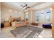 Large main bedroom with ample natural light, plush carpeting, and a relaxing atmosphere at 2554 N Tambor --, Mesa, AZ 85207