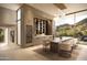 Elegant dining area with built-in wine storage and mountain views at 6623 N Hillside Dr, Paradise Valley, AZ 85253